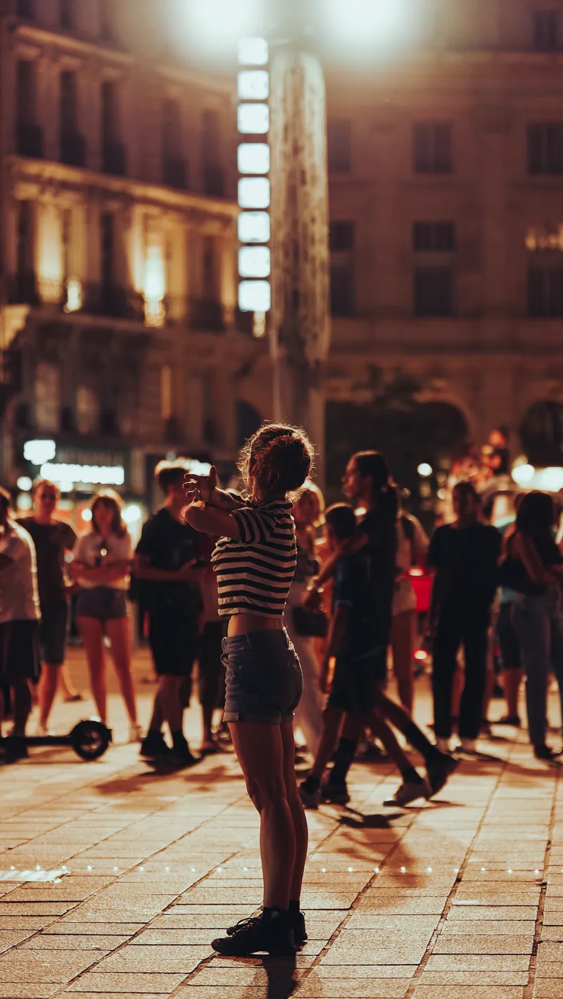 A night street lit by neon